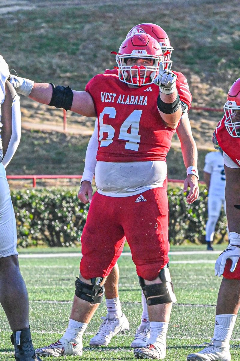 West Alabama offensive lineman number 64 on the field before a snap